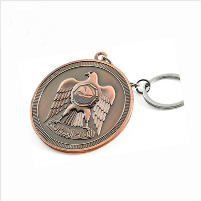 Antique eagle coin key tag