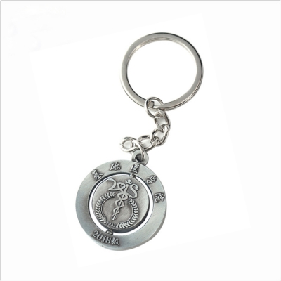 Wholesale vintage die struck spinning key chain